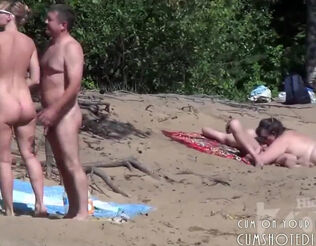 Oral pleasure on bare beach from spy camera