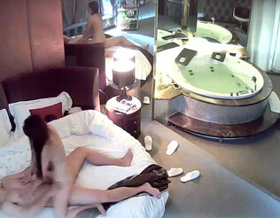 Spycam in motel suite display some sexual game of 2 chinese