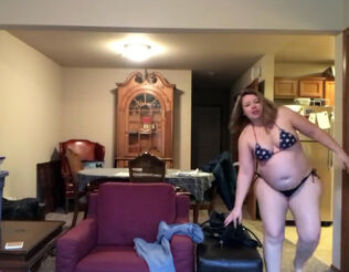 Fatty mother attempting swimsuit at home
